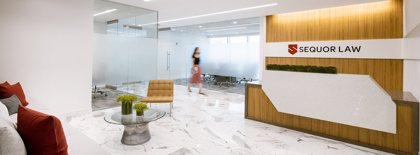 Lobby of Sequor Law’s modern office in Miami